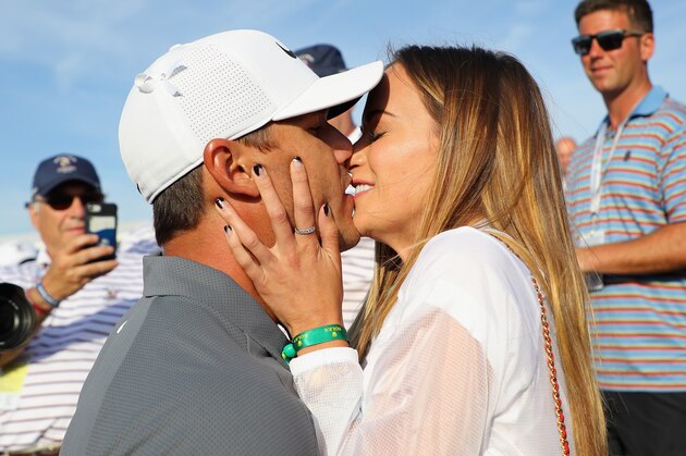 SOUTHAMPTON, NY - JUNE 17:  Brooks Koepka of the United States kisses girlfriend Jena Sims as they walk off the 18th green during the final round of the 2018 U.S. Open at Shinnecock Hills Golf Club on June 17, 2018 in Southampton, New York.  (Photo by Warren Little/Getty Images)