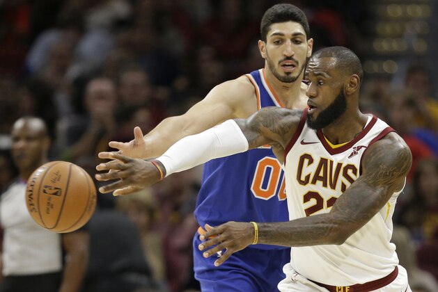 Cleveland Cavaliers' LeBron James (23) passes against New York Knicks' Enes Kanter (00) in the second half of an NBA basketball game, Sunday, Oct. 29, 2017, in Cleveland. The Knicks won 114-95. (AP Photo/Tony Dejak) Cleveland Cavaliers' LeBron James (23) passes against New York Knicks' Enes Kanter (00) in the second half of an NBA basketball game, Sunday, Oct. 29, 2017, in Cleveland. The Knicks won 114-95. (AP Photo/Tony Dejak)