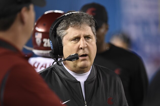 Washington State coach Mike Leach watches from the sideline during the first half of the team's Holiday Bowl NCAA college football game against Michigan State on Thursday, Dec. 28, 2017, in San Diego. (AP Photo/Denis Poroy)