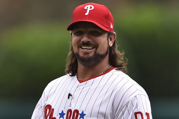 WWE superstar A.J. Styles throws out the ceremonial opening pitch prior to a baseball game between the Philadelphia Phillies and the Milwaukee Brewers, Sunday, July 23, 2017, in Philadelphia. (AP Photo/Derik Hamilton)