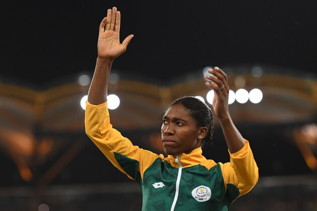 South Africas Caster Semenya (gold) poses on the podium after the athletics women's 800m final during the 2018 Gold Coast Commonwealth Games at the Carrara Stadium on the Gold Coast on April 13, 2018. / AFP PHOTO / SAEED KHAN        (Photo credit should read SAEED KHAN/AFP/Getty Images)