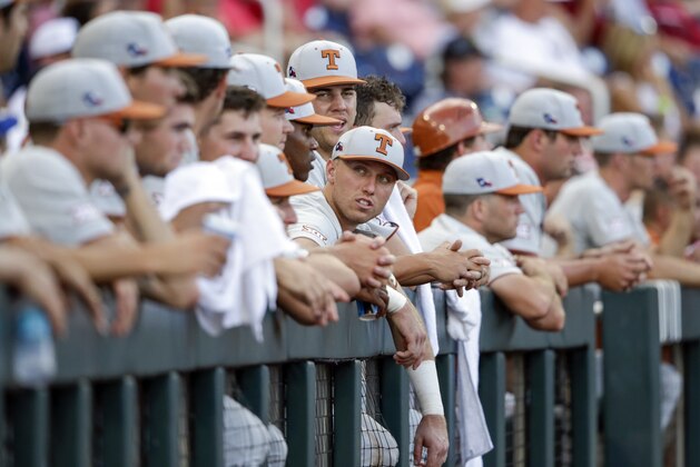 Texas second baseman Kody Clemens, center, follows from the dugout the eighth inning of an NCAA College World Series baseball game against Arkansas in Omaha, Neb., Sunday, June 17, 2018. Arkansas won 11-5. (AP Photo/Nati Harnik) Texas second baseman Kody Clemens, center, follows from the dugout the eighth inning of an NCAA College World Series baseball game against Arkansas in Omaha, Neb., Sunday, June 17, 2018. Arkansas won 11-5. (AP Photo/Nati Harnik)