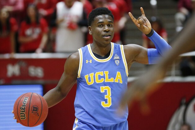 UCLA guard Aaron Holiday (3) brings the ball up court in the first half during an NCAA college basketball game against Utah Thursday, Feb. 22, 2018, in Salt Lake City. (AP Photo/Rick Bowmer)