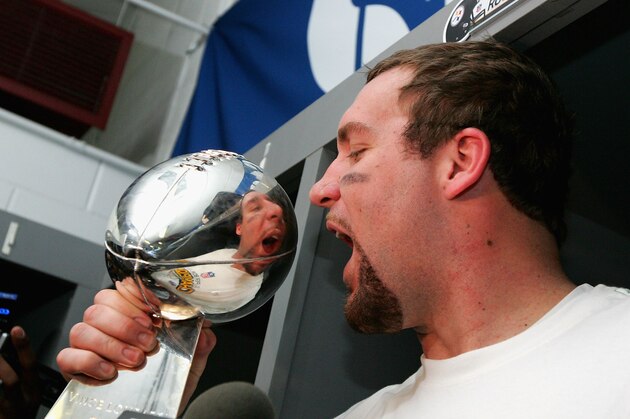 TAMPA, FL - FEBRUARY 01:  Quarterback Ben Roethlisberger #7 of the Pittsburgh Steelers celebrates with the Vince Lombardi trophy in the locker room after defeating the Arizona Cardinals during Super Bowl XLIII on February 1, 2009 at Raymond James Stadium in Tampa, Florida. The Steelers won the game by a score of 27-23.  (Photo by Al Bello/Getty Images)