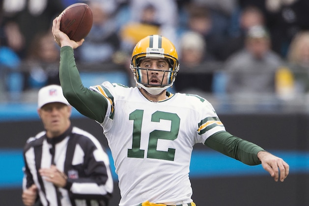 CHARLOTTE, NC - DECEMBER 17:  Aaron Rodgers #12 of the Green Bay Packers passes against the Carolina Panthers during a NFL game at Bank of America Stadium on December 17, 2017 in Charlotte, North Carolina.  (Photo by Ronald C. Modra/Sports Imagery/Getty Images)