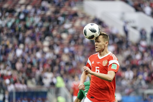 MOSCOW, RUSSIA - JUNE 14:  Denis Cheryshev of Russia runs with the ball during the 2018 FIFA World Cup Russia Group A match between Russia and Saudi Arabia at Luzhniki Stadium on June 14, 2018 in Moscow, Russia.(Photo by XIN LI/Getty Images)