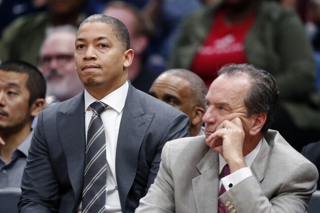 Cleveland Cavaliers head coach Tyronn Lue, watches from the bench with assistant coach Jim Boylan, right, in the second half of an NBA basketball game in New Orleans, Saturday, Oct. 28, 2017. The Pelicans won 123-101. (AP Photo/Gerald Herbert)