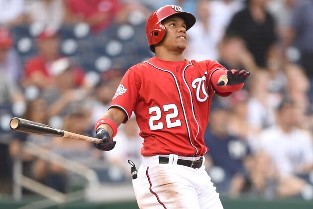 WASHINGTON, DC - JUNE 18:  Juan Soto #22 of the Washington Nationals hits a two run home run in the sixth inning during game one of a doubleheader against the New York Yankees at Nationals Park on June 18, 2018 in Washington, DC. Game one is the completion of a game that was suspended on May 15th due to rain.  (Photo by Mitchell Layton/Getty Images)