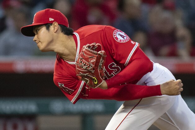 Los Angeles Angels starting pitcher Shohei Ohtani watches a pitch during the third inning of a baseball game against the Kansas City Royals in Anaheim, Calif., Wednesday, June 6, 2018. (AP Photo/Kyusung Gong)