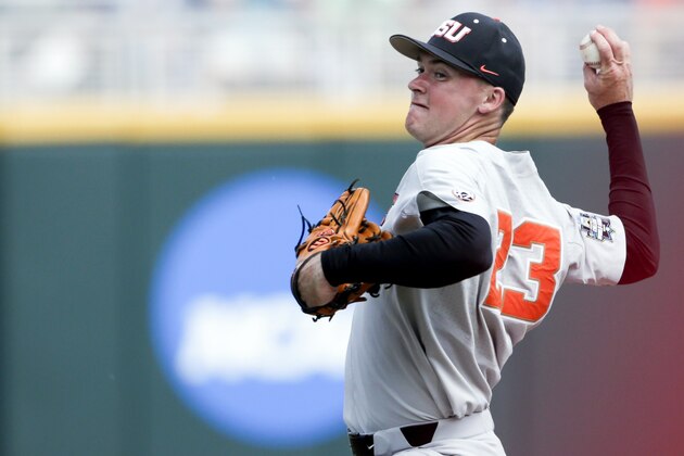 Oregon State pitcher Kevin Abel (23) works against Washington in the fifth inning of an NCAA College World Series baseball elimination game in Omaha, Neb., Monday, June 18, 2018. (AP Photo/Nati Harnik)