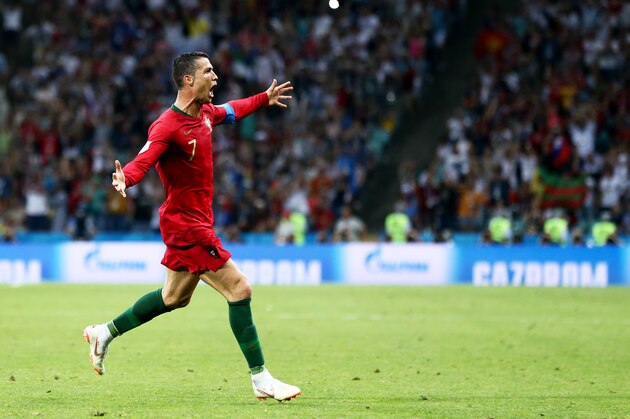 SOCHI, RUSSIA - June 15: Cristiano Ronaldo #7 of Portugal celebrates after scoring a goal against the Spain during the 2018 FIFA World Cup Russia group B match between Portugal and Spain at Fisht Stadium on June 15, 2018 in Sochi, Russia. (Photo by Maddie Meyer/Getty Images)