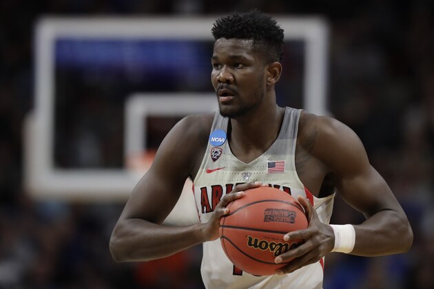 Arizona forward Deandre Ayton holds the ball against Buffalo during the first half of a first-round game in the NCAA men's college basketball tournament Thursday, March 15, 2018, in Boise, Idaho. (AP Photo/Ted S. Warren)