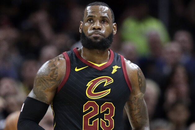 Cleveland Cavaliers' LeBron James looks up at the scoreboard during the first half against the Golden State Warriors in Game 3 of basketball's NBA Finals, Wednesday, June 6, 2018, in Cleveland. (AP Photo/Tony Dejak)