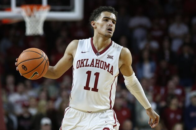 Oklahoma guard Trae Young (11) in the second half of an NCAA college basketball game against Texas in Norman, Okla., Saturday, Feb. 17, 2018. (AP Photo/Sue Ogrocki)