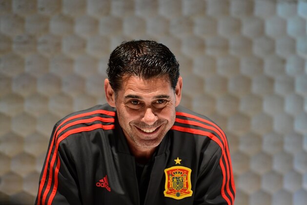 Spain's coach Fernando Hierro smiles as he meets with Spanish journalists at Krasnodar Academy on June 18, 2018, during the Russia 2018 World Cup football tournament. (Photo by PIERRE-PHILIPPE MARCOU / AFP)        (Photo credit should read PIERRE-PHILIPPE MARCOU/AFP/Getty Images)