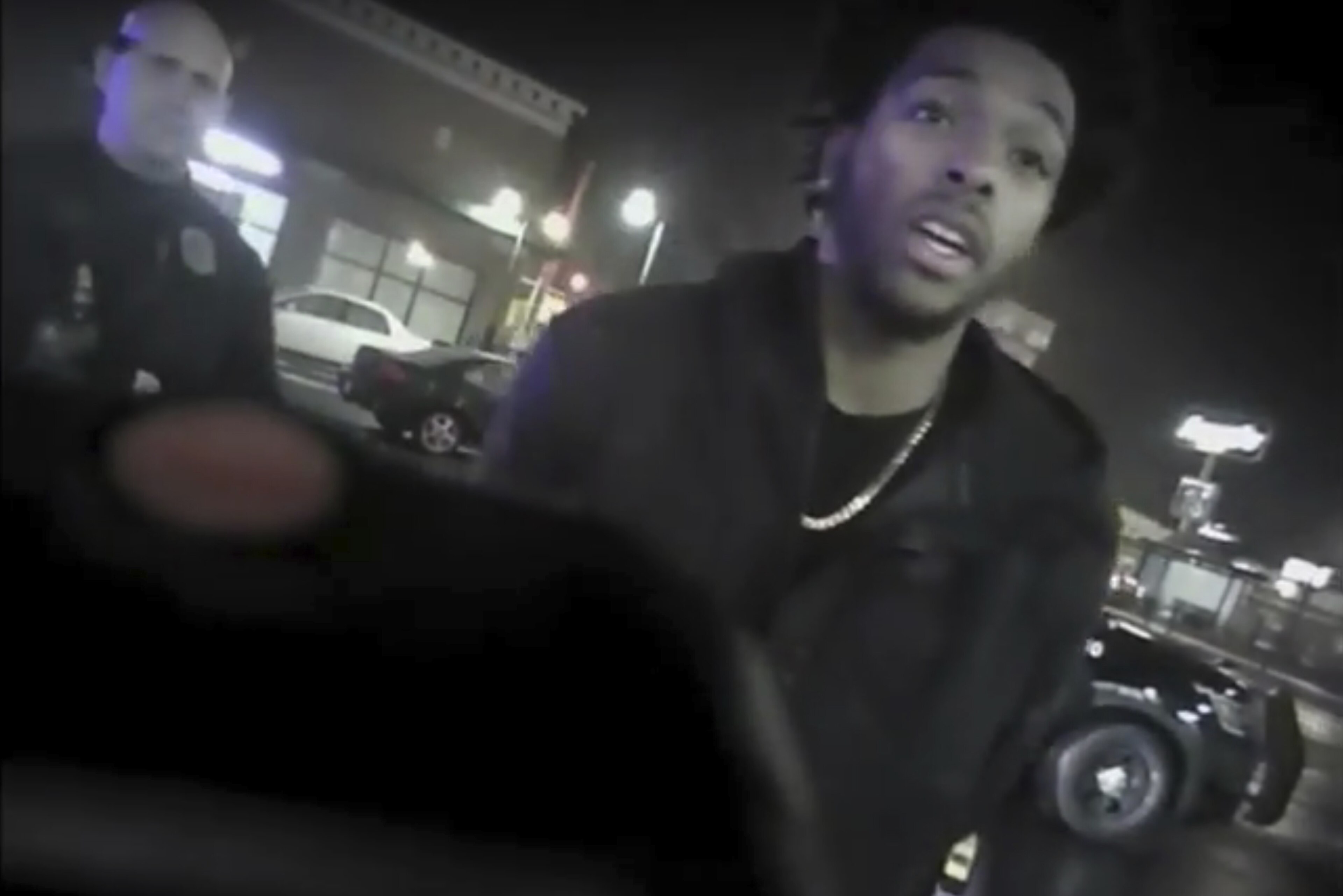 This Jan. 26, 2018 police body-camera footage released by Milwaukee Police Department shows NBA Bucks guard Sterling Brown as he talks to arresting police officers after being shot by a stun gun in a Walgreens parking lot in Milwaukee. The release comes as city officials who've viewed the videos have expressed concern about how officers conducted themselves. Even leaders of the police department have hinted the video may make them look bad. (Milwaukee Police Department via AP) This Jan. 26, 2018 police body-camera footage released by Milwaukee Police Department shows NBA Bucks guard Sterling Brown as he talks to arresting police officers after being shot by a stun gun in a Walgreens parking lot in Milwaukee. The release comes as city officials who've viewed the videos have expressed concern about how officers conducted themselves. Even leaders of the police department have hinted the video may make them look bad. (Milwaukee Police Department via AP)