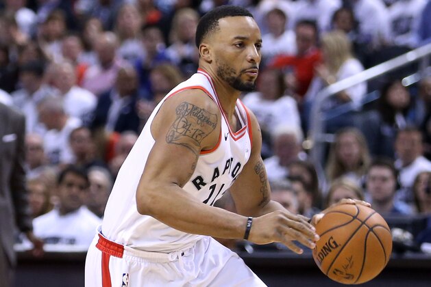 TORONTO, ON - APRIL 25:  Norman Powell #24 of the Toronto Raptors dribbles the ball during the second half of Game Five against the Washington Wizards in Round One of the 2018 NBA playoffs at Air Canada Centre on April 25, 2018 in Toronto, Canada.  NOTE TO USER: User expressly acknowledges and agrees that, by downloading and or using this photograph, User is consenting to the terms and conditions of the Getty Images License Agreement.  (Photo by Vaughn Ridley/Getty Images)'n