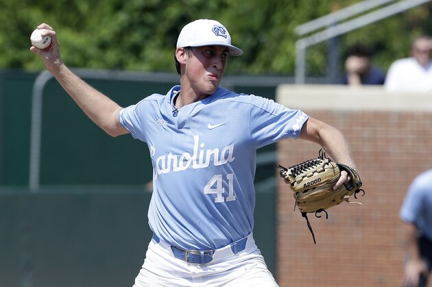 North Carolina pitcher Cooper Criswell (41) throws against Stetson during the first inning of an NCAA super regional college baseball game in Chapel Hill, N.C., Friday, June 8, 2018. (AP Photo/Gerry Broome)
