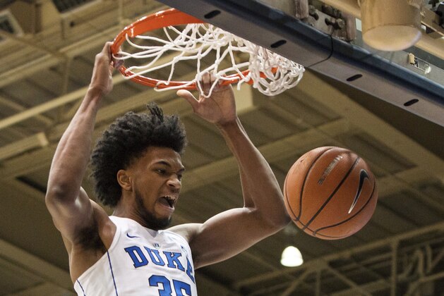 FILE - In this Jan. 27, 2018, file photo, Duke's Marvin Bagley III (35) dunks the ball during the first half of an NCAA college basketball game against Virginia in Durham, N.C. Bagley ranks second in the ACC in scoring and first in rebounding entering the fifth-ranked Blue Devils' regular-season finale against North Carolina.  (AP Photo/Ben McKeown, File)