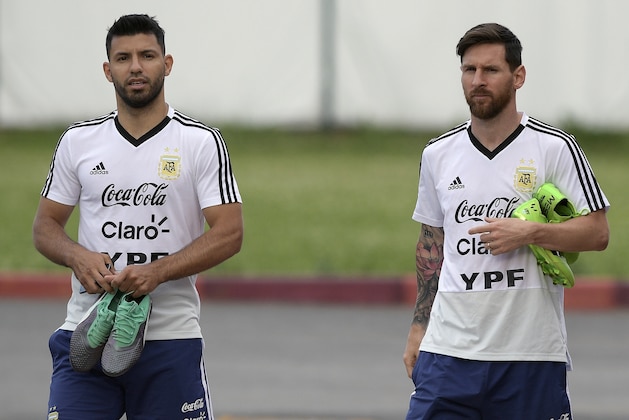 Argentina's forwards Lionel Messi (R) and Sergio Aguero attend a training session at the team's base camp in Bronnitsy, near Moscow, on June 19, 2018 ahead of their Russia 2018 World Cup Group D football match against Croatia to be held in Nizhni Novgorod on June 21. (Photo by JUAN MABROMATA / AFP)        (Photo credit should read JUAN MABROMATA/AFP/Getty Images)