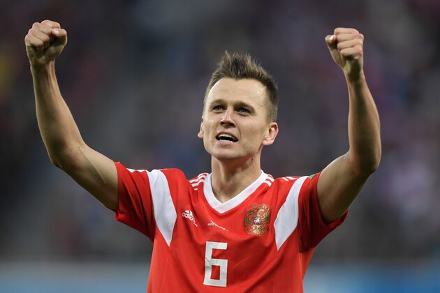 Russia's midfielder Denis Cheryshev celebrates scoring the 2-0 goal during the Russia 2018 World Cup Group A football match between Russia and Egypt at the Saint Petersburg Stadium in Saint Petersburg on June 19, 2018. (Photo by GABRIEL BOUYS / AFP) / RESTRICTED TO EDITORIAL USE - NO MOBILE PUSH ALERTS/DOWNLOADS        (Photo credit should read GABRIEL BOUYS/AFP/Getty Images)