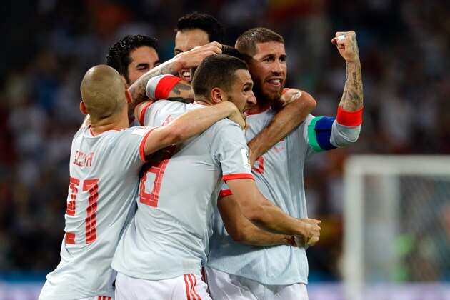 SOCHI, RUSSIA - JUNE 15: Nacho Fernandez of Spain celebrates with teammates after scoring his team`s third goal with team mates during the 2018 FIFA World Cup Russia group B match between Portugal and Spain at Fisht Stadium on June 15, 2018 in Sochi, Russia. (Photo by TF-Images/Getty Images)