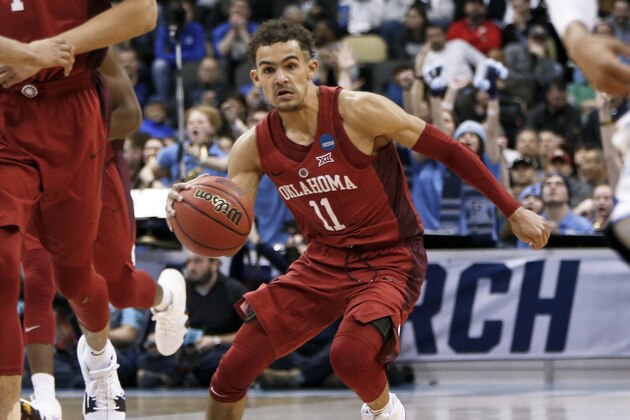 Oklahoma's Trae Young drives to the hoop during overtime of an NCAA men's college basketball tournament first-round game against Rhode Island, Thursday, March 15, 2018, in Pittsburgh. (AP Photo/Keith Srakocic)