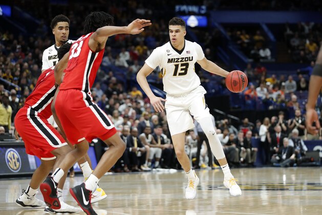Missouri's Michael Porter Jr. brings the ball down the court during the first half in an NCAA college basketball game against Georgia at the Southeastern Conference tournament Thursday, March 8, 2018, in St. Louis. (AP Photo/Jeff Roberson)