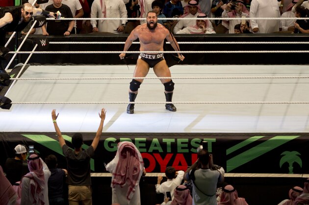 World Wrestling star Rusev is greeted by fans during his match of the