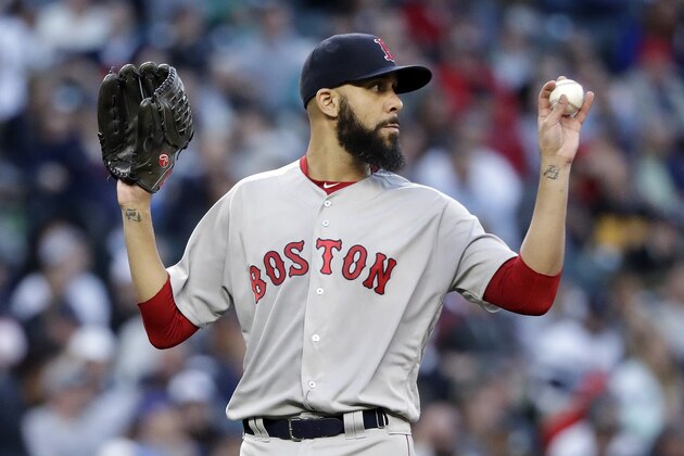 Boston Red Sox starting pitcher David Price calls for a new ball after giving up two hits to the Seattle Mariners during the fifth inning of a baseball game Thursday, June 14, 2018, in Seattle. (AP Photo/Elaine Thompson)