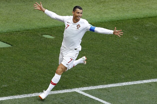 Portugal's Cristiano Ronaldo celebrates after scoring the opening goal during the group B match between Portugal and Morocco at the 2018 soccer World Cup in the Luzhniki Stadium in Moscow, Russia, Wednesday, June 20, 2018. (AP Photo/Victor Caivano)