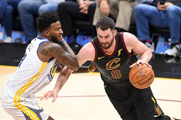 CLEVELAND, OH - JUNE 08:  Kevin Love #0 of the Cleveland Cavaliers drives to the basket defended by Jordan Bell #2 of the Golden State Warriors in the first half during Game Four of the 2018 NBA Finals at Quicken Loans Arena on June 8, 2018 in Cleveland, Ohio. NOTE TO USER: User expressly acknowledges and agrees that, by downloading and or using this photograph, User is consenting to the terms and conditions of the Getty Images License Agreement.  (Photo by Jason Miller/Getty Images)