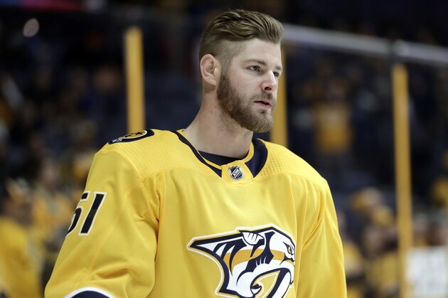 FILE - In this Jan. 21, 2018, file photo, Nashville Predators left wing Austin Watson warms up before an NHL hockey game against the Florida Panthers, in Nashville, Tenn. Police in Tennessee have arrested Nashville Predators forward Austin Watson on a charge of domestic assault. Franklin Police Lt. Charles Warner said Watson was arrested Saturday evening, June 16, 2018. (AP Photo/Mark Humphrey, File)