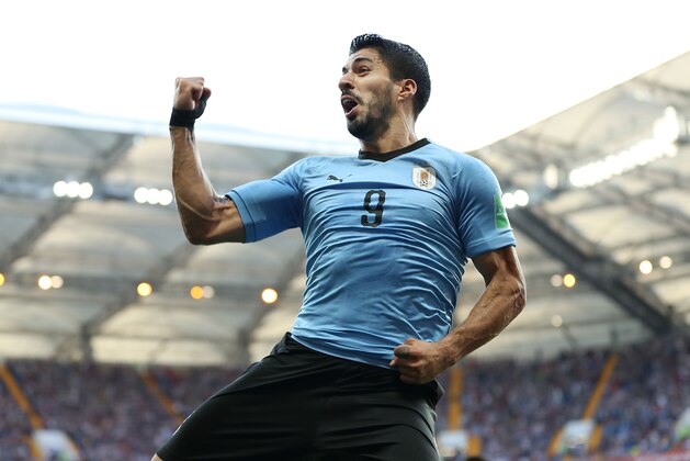 ROSTOV-ON-DON, RUSSIA - JUNE 20:  Luis Suarez of Uruguay celebrates after scoring his team's first goal during the 2018 FIFA World Cup Russia group A match between Uruguay and Saudi Arabia at Rostov Arena on June 20, 2018 in Rostov-on-Don, Russia.  (Photo by Ryan Pierse/Getty Images)
