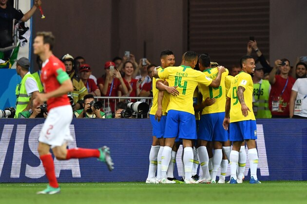 Brazil's players celebrate a goal by forward Philippe Coutinho during the Russia 2018 World Cup Group E football match between Brazil and Switzerland at the Rostov Arena in Rostov-On-Don on June 17, 2018. (Photo by JOE KLAMAR / AFP) / RESTRICTED TO EDITORIAL USE - NO MOBILE PUSH ALERTS/DOWNLOADS        (Photo credit should read JOE KLAMAR/AFP/Getty Images)
