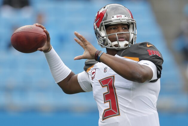 Tampa Bay Buccaneers' Jameis Winston (3) warms up before an NFL football game against the Carolina Panthers in Charlotte, N.C., Sunday, Dec. 24, 2017. (AP Photo/Bob Leverone)