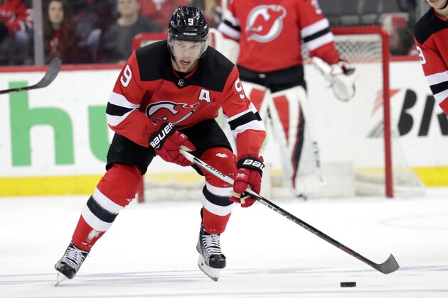 New Jersey Devils left wing Taylor Hall skates against the Tampa Bay Lightning during the second period of Game 4 of an NHL first-round hockey playoff series, Wednesday, April 18, 2018, in Newark, N.J. (AP Photo/Julio Cortez)