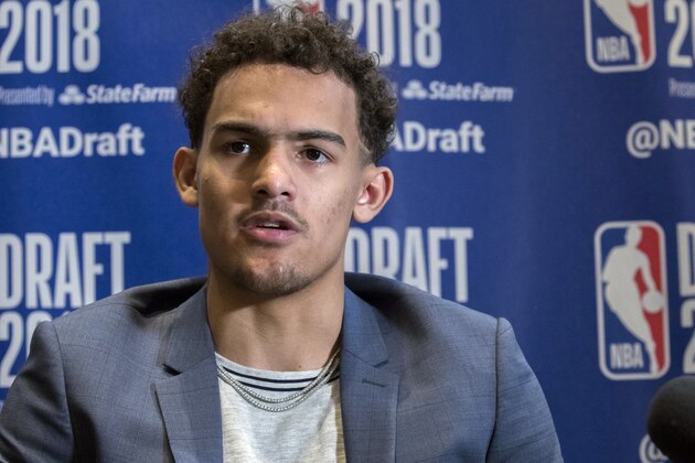 Oklahoma's Trae Young speaks to reporters during a media availability with the top basketball prospects in the NBA Draft, Wednesday, June 20, 2018, in New York. (AP Photo/Mary Altaffer)