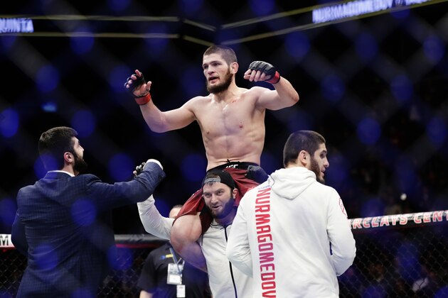 Russia's Khabib Nurmagomedov celebrates after a lightweight title bout against Al Iaquinta at UFC 223 early Sunday, April 8, 2018, in New York. Nurmagomedov won the fight. (AP Photo/Frank Franklin II)