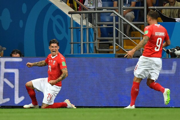 Switzerland's midfielder Steven Zuber (L) celebrates his goal during the Russia 2018 World Cup Group E football match between Brazil and Switzerland at the Rostov Arena in Rostov-On-Don on June 17, 2018. (Photo by JOE KLAMAR / AFP) / RESTRICTED TO EDITORIAL USE - NO MOBILE PUSH ALERTS/DOWNLOADS (Photo credit should read JOE KLAMAR/AFP/Getty Images) Switzerland's midfielder Steven Zuber (L) celebrates his goal during the Russia 2018 World Cup Group E football match between Brazil and Switzerland at the Rostov Arena in Rostov-On-Don on June 17, 2018. (Photo by JOE KLAMAR / AFP) / RESTRICTED TO EDITORIAL USE - NO MOBILE PUSH ALERTS/DOWNLOADS (Photo credit should read JOE KLAMAR/AFP/Getty Images)