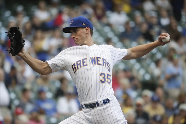 Milwaukee Brewers pitcher Brent Suter throws during the first inning of the team's baseball game against the Philadelphia Phillies on Friday, June 15, 2018, in Milwaukee. (AP Photo/Morry Gash)