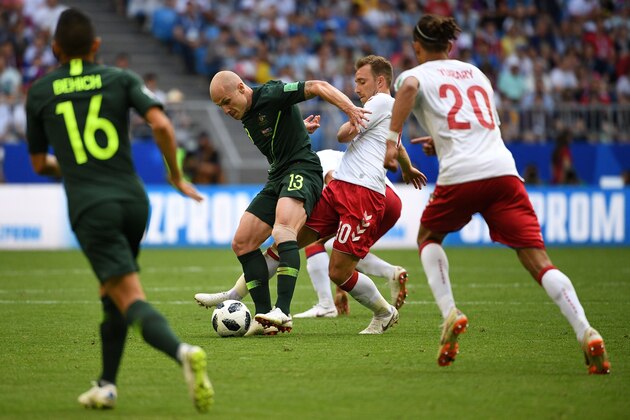 Denmark's midfielder Christian Eriksen (CR) tangles with Australia's midfielder Aaron Mooy (CL) during the Russia 2018 World Cup Group C football match between Denmark and Australia at the Samara Arena in Samara on June 21, 2018. (Photo by MANAN VATSYAYANA / AFP) / RESTRICTED TO EDITORIAL USE - NO MOBILE PUSH ALERTS/DOWNLOADS        (Photo credit should read MANAN VATSYAYANA/AFP/Getty Images)