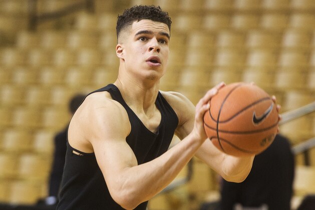 FILE - In this March 3, 2018, file photo, Missouri's Michael Porter Jr. shoots baskets before an NCAA college basketball game against Arkansas in Columbia, Mo. Porter was considered by many as last year’s top recruit with his scoring, playmaking ability and athleticism. Porter and Marvin Bagley III will likely be the first forwards to hear their names called during Thursday's NBA Draft.  (AP Photo/L.G. Patterson, File)