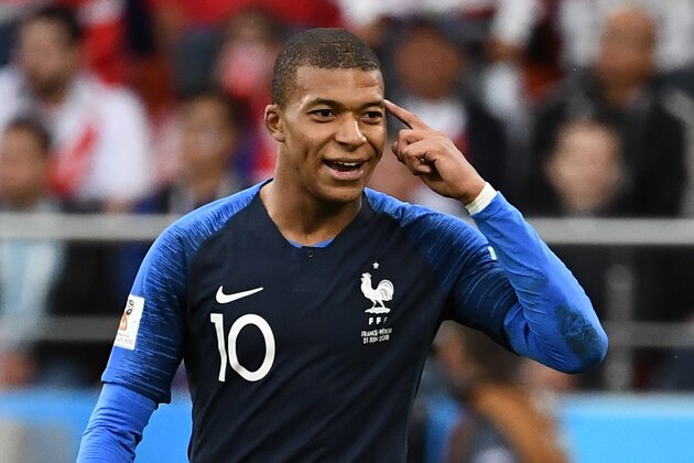 France's forward Kylian Mbappe celebrates after scoring a goal during the Russia 2018 World Cup Group C football match between France and Peru at the Ekaterinburg Arena in Ekaterinburg on June 21, 2018. (Photo by FRANCK FIFE / AFP) / RESTRICTED TO EDITORIAL USE - NO MOBILE PUSH ALERTS/DOWNLOADS        (Photo credit should read FRANCK FIFE/AFP/Getty Images)