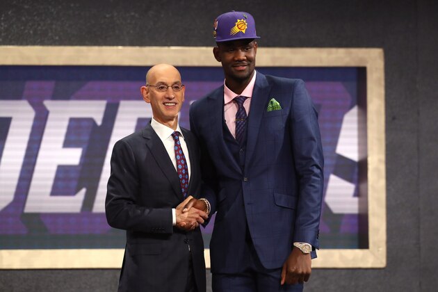 NEW YORK, NY - JUNE 21: Deandre Ayton poses with NBA Commissioner Adam Silver after being drafted first overall by the Phoenix Suns during the 2018 NBA Draft at the Barclays Center on June 21, 2018 in the Brooklyn borough of New York City. NOTE TO USER: User expressly acknowledges and agrees that, by downloading and or using this photograph, User is consenting to the terms and conditions of the Getty Images License Agreement.  (Photo by Mike Stobe/Getty Images)