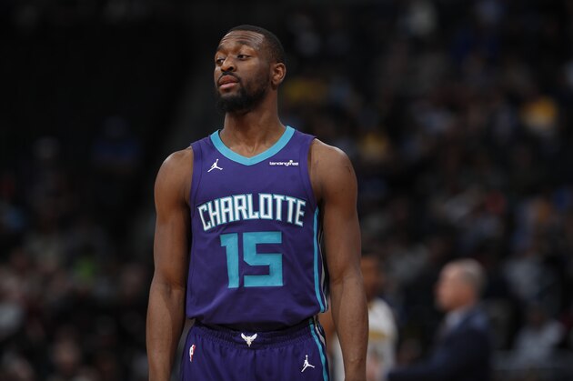 Charlotte Hornets guard Kemba Walker (15) in the second half of an NBA basketball game Monday, Feb. 5, 2018, in Denver. The Nuggets won 121-104. (AP Photo/David Zalubowski)