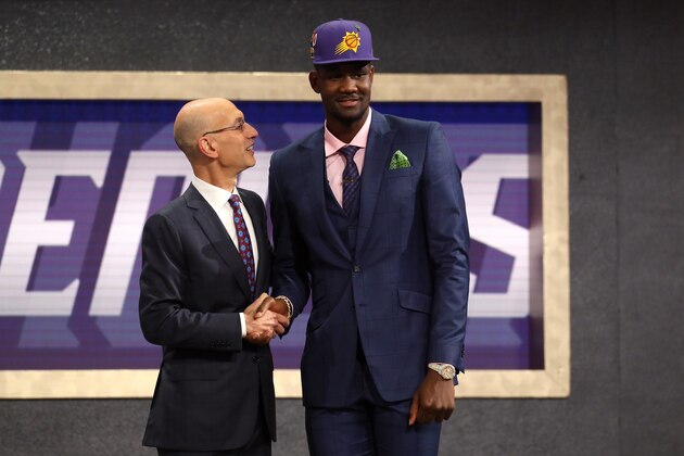 NEW YORK, NY - JUNE 21:  Deandre Ayton poses with NBA Commissioner Adam Silver after being drafted first overall by the Phoenix Suns during the 2018 NBA Draft at the Barclays Center on June 21, 2018 in the Brooklyn borough of New York City. NOTE TO USER: User expressly acknowledges and agrees that, by downloading and or using this photograph, User is consenting to the terms and conditions of the Getty Images License Agreement.  (Photo by Mike Stobe/Getty Images)