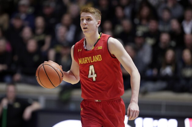 Maryland guard Kevin Huerter (4) brings the ball up court against Purdue in the first half of an NCAA college basketball game in West Lafayette, Ind., Wednesday, Jan. 31, 2018. (AP Photo/Michael Conroy)