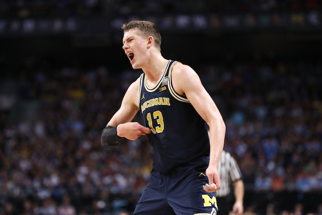 SAN ANTONIO, TX - APRIL 02:  Moritz Wagner #13 of the Michigan Wolverines reacts against the Villanova Wildcats in the second half during the 2018 NCAA Men's Final Four National Championship game at the Alamodome on April 2, 2018 in San Antonio, Texas. The Villanova Wildcats defeated the Michigan Wolverines 79-62.  (Photo by Ronald Martinez/Getty Images)