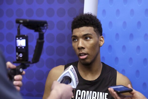Allonzo Trier, from Arizona, talks to reporters during the NBA basketball draft combine Thursday, May 17, 2018, in Chicago. (AP Photo/Charles Rex Arbogast)